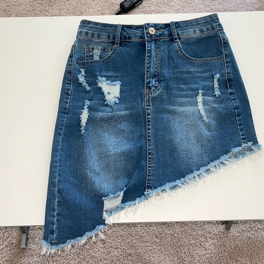 💙💎Stretchy diagonal/asymmetrical cut ripped jean skirt never worn! Make offers